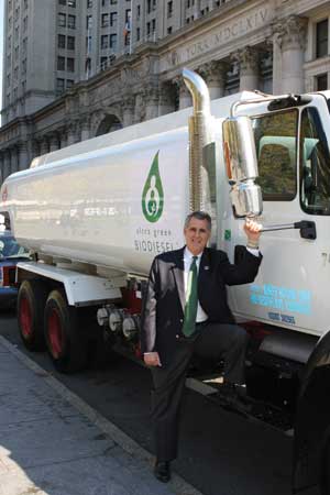 Gennaro, also chairman of the council's committee on environmental protection, stands next to an Ultra Green Biodiesel delivery truck.