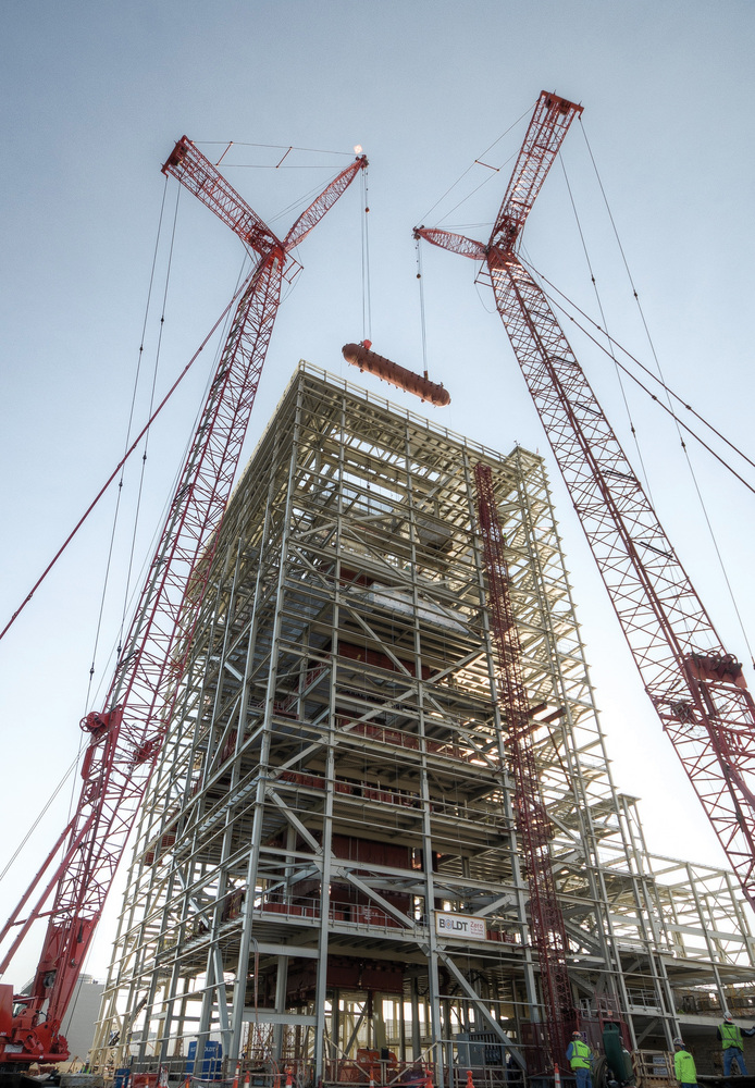 LOFTY LIFT: Two 350-ton cranes were required to lift the plant's massive steam drum.