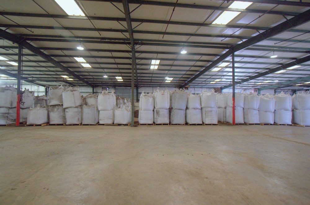 READY TO ROLL: Completed and bagged torrefied pellets in storage at New Biomass Energy.