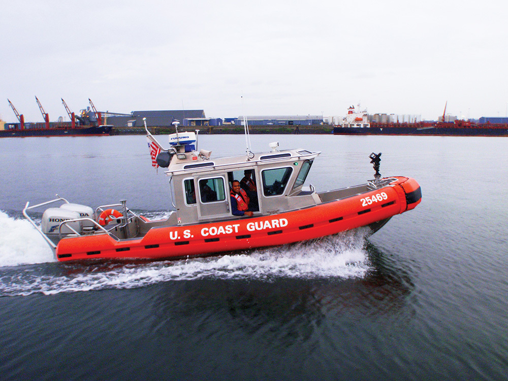BOATING WITH ISOBUTANOL: The isobutanol blended fuels are being tested in a 25-foot response boat, left, and a 38-foot special purpose craft at its training center in Yorktown, Va. 