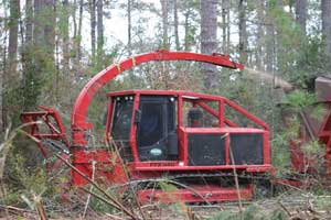 One challenge for researchers at North Carolina State University is to keep this 54,000-pound biomass harvesting machine from sinking into the soft soils of the coastal plain. 