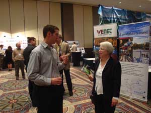 CANBIO's Paul Buckley, left, talks with World Bioenergy Association Secretary Karin Haara during the trade show of CANBIO's annual event.