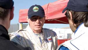 Zadig talks to his teammates during the 25 Hours of Thunderhill 