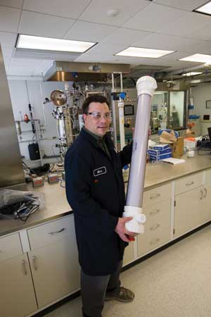 Coskata engineer Mike Sura holds one of the company's patented bioreactors.