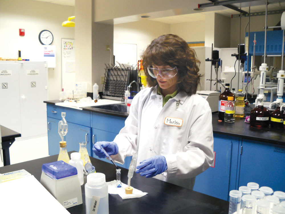 Yeast Check: Marisa Tarpinian, at NCERC,  prepares a mash sample to do yeast cell counts and viability by staining the solution with methylene blue.