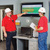Every morning, the previous dayâ€™s numbers are posted on the scoreboard and displayed in each department. Here, Tim Crabtree, production manager, and Brent Fehn, lead operator, discuss what needs to be changed to bring more of th